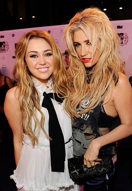 Musicians Miley Cyrus and Ke$ha attend the MTV Europe Music Awards 2010 at La Caja Magica on November 7, 2010 in Madrid, Spain.