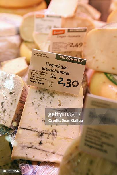Organic cheese varieties lie in a refrigerator display at a branch of German organic grocery store chain Bio Company on January 10, 2011 in Berlin,...