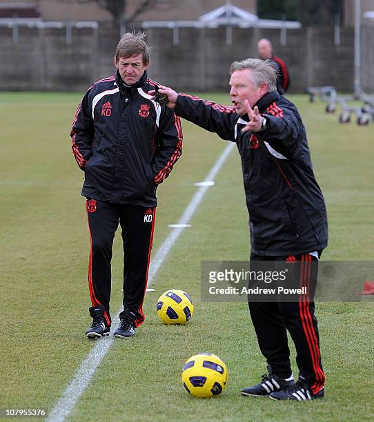 Kenny Dalglish the new manager of Liverpool and Sammy Lee assistant manager during a Liverpool training session at Melwood Training Ground on January...