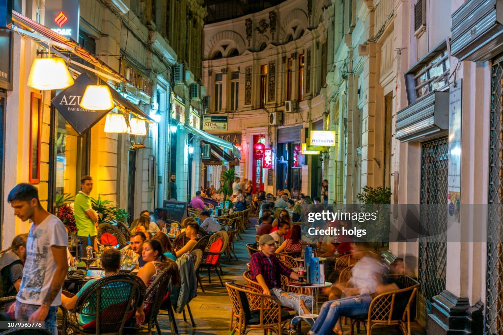 Cafes within the Pasajul Macca- Vilacrosse Arcade at night in Bucharest, Romania, Europe