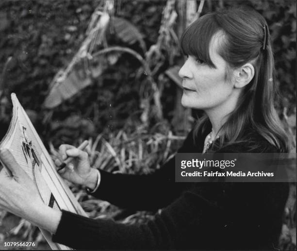 Merelyn Buzo Teaches Art at the Correspondence School in William Street Photographed Sketching and Sitting in Front of A Students Design Painting....