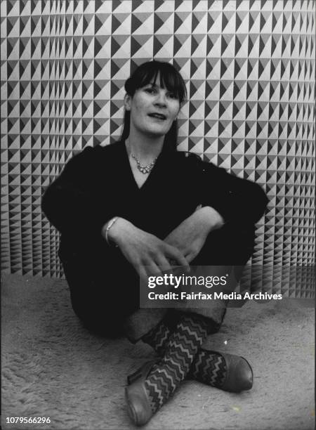 Marelyn Alexander Buzo Teaches Art at The Correspondence School in William Street Photographed Sketching And Sitting in Front of A Students Design...