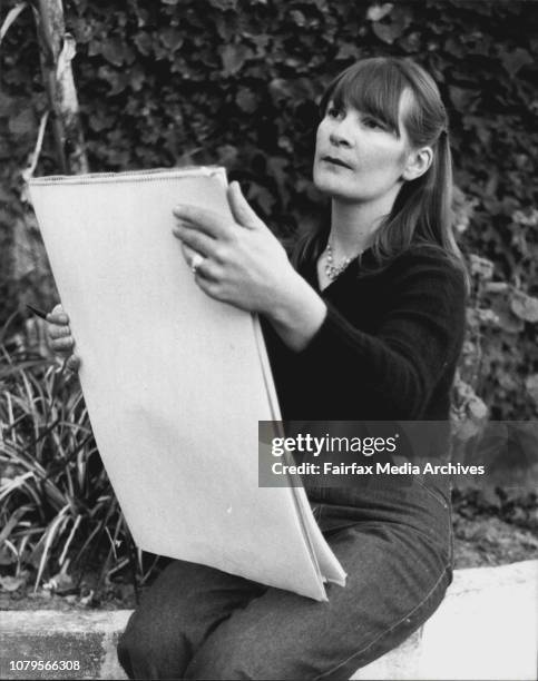 Merelyn Buzo Teaches Art at the Correspondence School in William Street Photographed Sketching and Sitting in Front of A Students Design Painting....