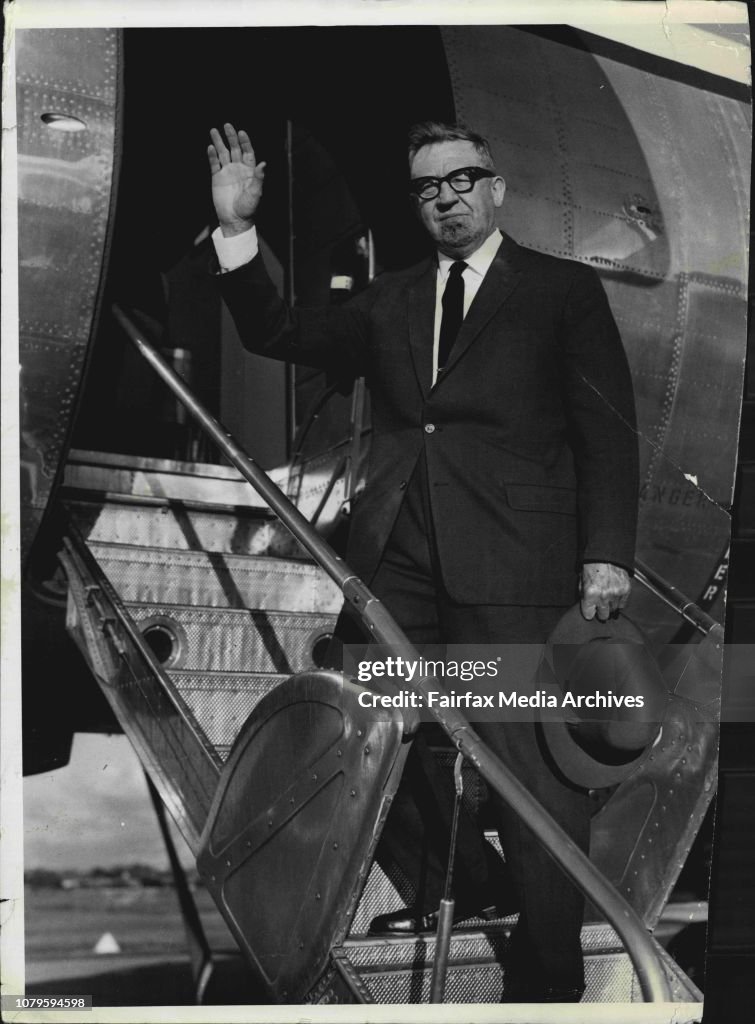 Mr. Arthur Calwell sating goodbye at mascot Aerodrome before departing for Melbourne.