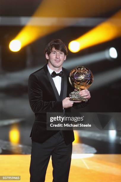 Lionel Messi of Argentina and Barcelona FC receives the men's player of the year award during the FIFA Ballon d'or Gala at the Zurich Kongresshaus on...