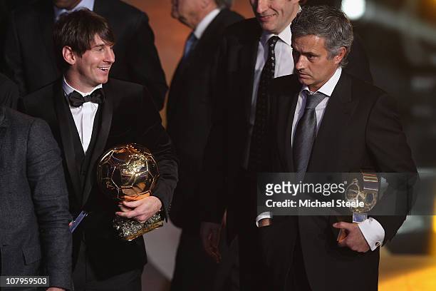 Lionel Messi of Argentina and Barcelona FC winner of the men's player of the year alongside Jose Mourinho of Portugal and Real Madrid FC winner of...