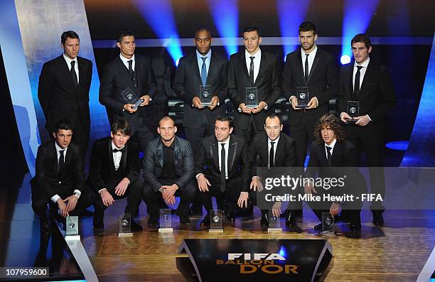 The 2010 FIFpro XI consisting of Marco Van Basten Cristiano Ronaldo, Maicon, Lucio, Pique, Iker Casillas, David Villa, Lionel Messi, Wesley Sneijder,...