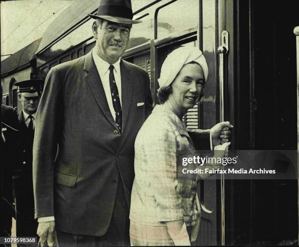 Sir Roden and Lady Cutler board the train at Central Railway Station for the regatta.Lady Cutler said she was barracking for Shore, but Sir Roden...