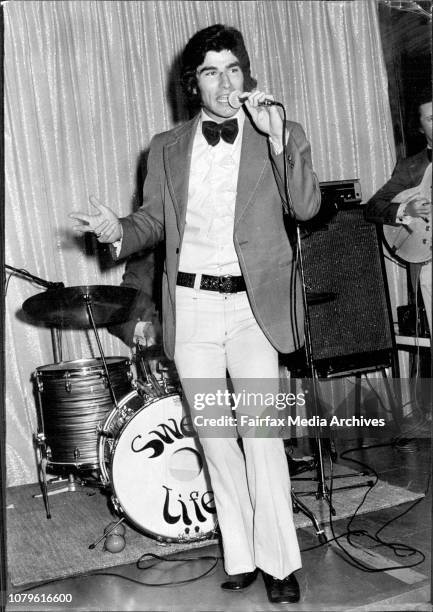 Rugby League Player, Terry Murphy sings &amp; plays in the Band at South Sydney Junior Leagues Club. April 28, 1973. .