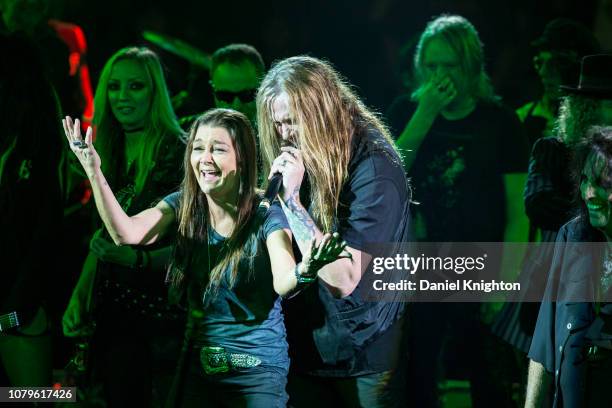 Musicians Gretchen Wilson and Sebastian Bach perform on stage at Celebrity Theatre on December 08, 2018 in Phoenix, Arizona.