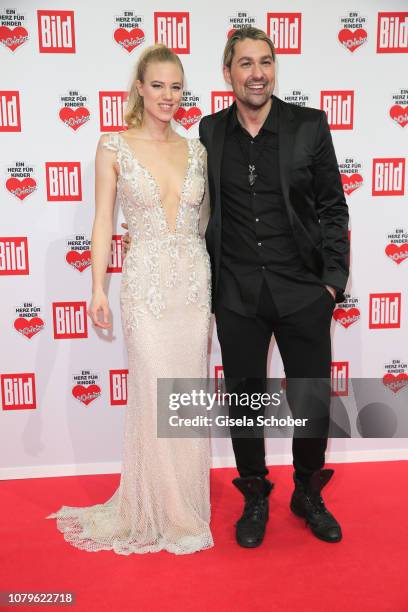 Larissa Marolt and David Garrett during the Ein Herz Fuer Kinder Gala at Studio Berlin Adlershof on December 8, 2018 in Berlin, Germany.