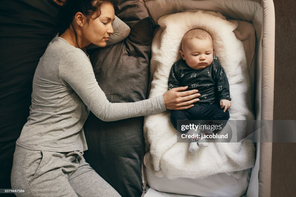 Mother and baby sleeping