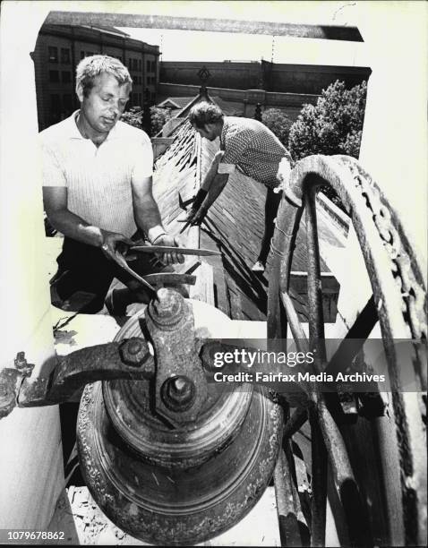 Left to right Mr. Gustav Garbers of Gladesville and Mr. Stan Rose of Newtown from Garbers Roofing in Gladesville restore the slates on the roof of...