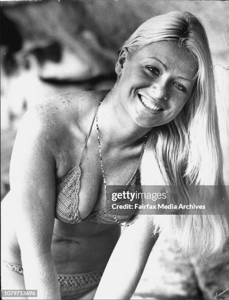 Today's weather girl is Kathy Troutt of Gymea. Kathy is a Model and was pictured at Mrs. MacQuarie's Chair. January 24, 1974. .