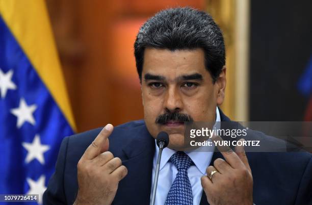 Venezuela's President Nicolas Maduro speaks during a press conference, where he warned the Lima Group that he would take energetic measures if they...