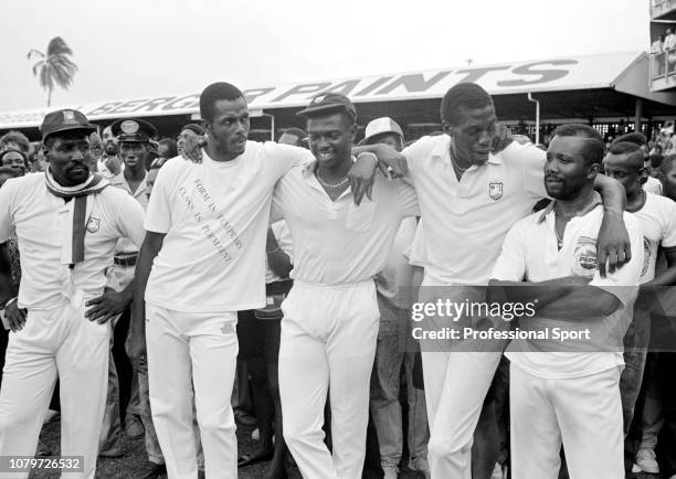 West Indies players wait for the end of match presentation after the 4th Test match between the West Indies and Australia at the Kensington Oval on...