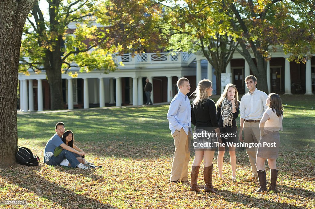 UVa students enjoy a fall afternoon on the "Lawn", on the ground