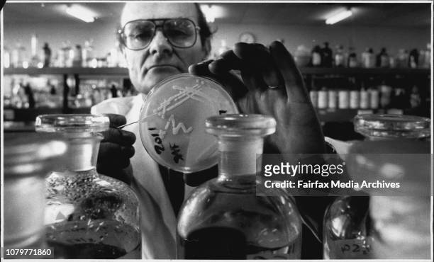 Assoc. Prof. John Redmond of Macquarie Uni. With some Mutant Rhizobium, a bug which enters legume roots and causes nitrogen fixation. July 30, 1987. .
