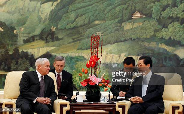 Secretary of Defense Robert Gates and China's President Hu Jintao meet at the Great Hall of the People on January 11, 2011 in Beijing, China. Gates...