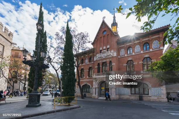 historical building next to the indoor central market market square in valencia, spain - wrought iron stock pictures, royalty-free photos & images