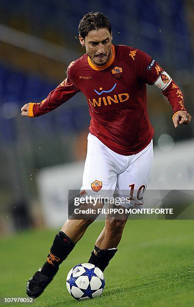 Roma's forward Francesco Totti plays the ball against FC Basel during their group E Champion's League football match against FC Basel in Rome's...
