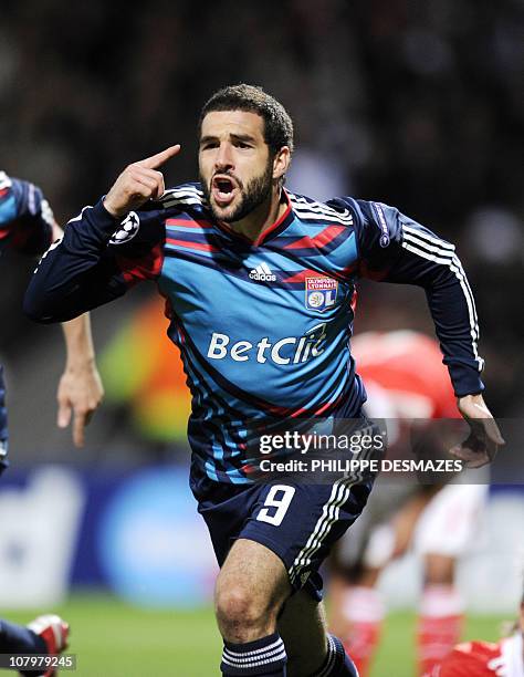 Lyon's Argentinian forward Lisandro Lopez celebrates after scoring a goal during the UEFA Champions League football match Lyon vs. Benfica on October...