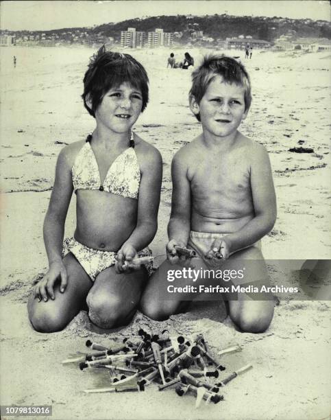 Samantha 7 yrs Lee 6 yrs Hederson of Narrabeen with 69 Hypodermic needles which they found on the beach near high water mark about 9.30 am today all...