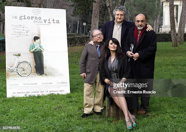 Ernesto Mahieux, Giuseppe Papasso, Maria Grazia Cucinotta, Giorgio Haber attend the "Un Giorno della Vita" photocall at La Casa Del Cinema on January...