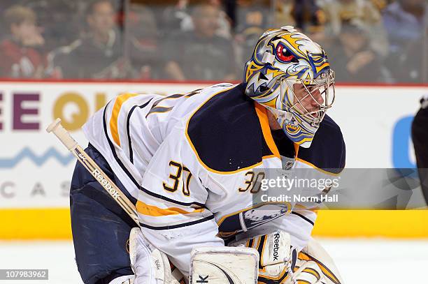 Goaltender Ryan Miller of the Buffalo Sabres looks up ice during a stop in play against the Phoenix Coyotes on January 8, 2011 at Jobing.com Arena in...