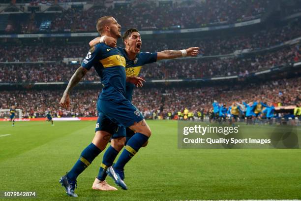 Dario Benedetto of Boca Juniors celebrates with Cristian Pavon of Boca Juniors after scoring his team's first goal during the second leg of the final...