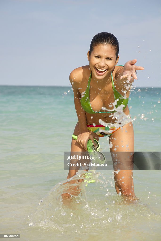 Woman wearing swimsuit on Kailua Beach, Hawaii