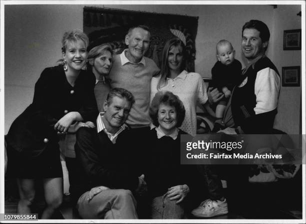 Close-knit clan... Bill and Margaret Robinson, seated, with daughter Mandi, left, son Andrew, holding baby Tom, Andrew's , wife Shelley, and her...