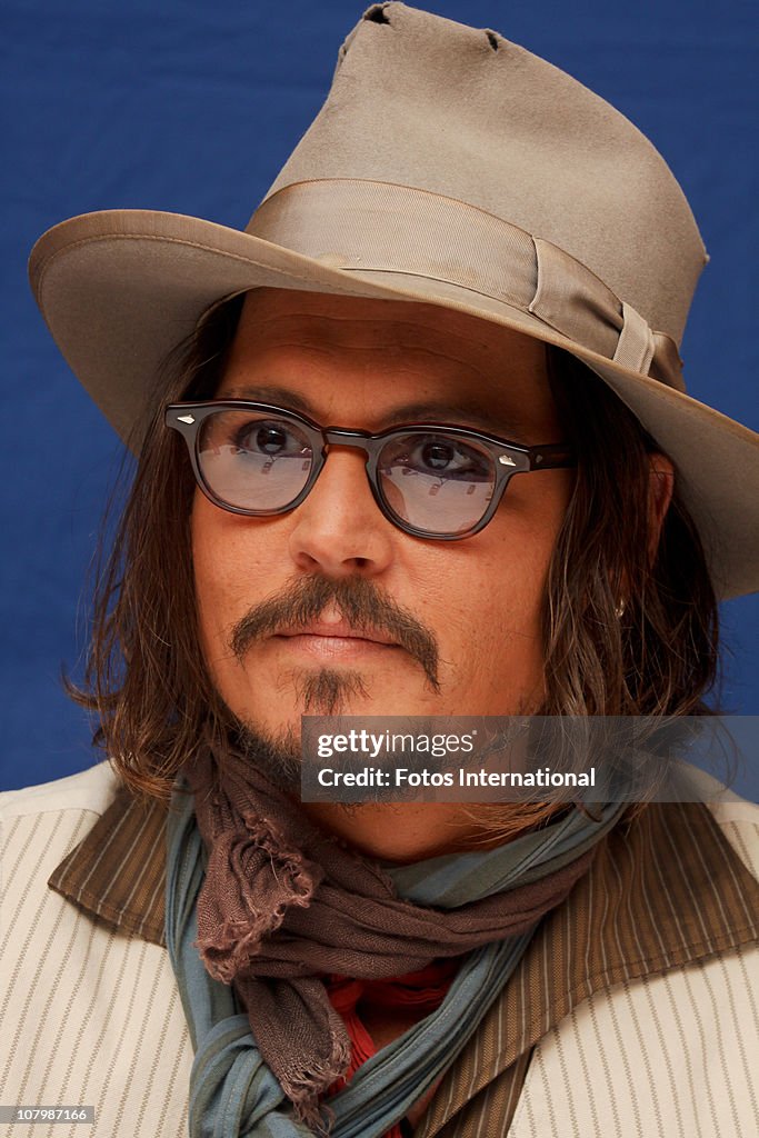 Johnny Depp Poses For A Photo During A Portrait Session At The Ritz johnny-depp-poses-for-a-photo-during-a-portrait-session-at-the-ritz