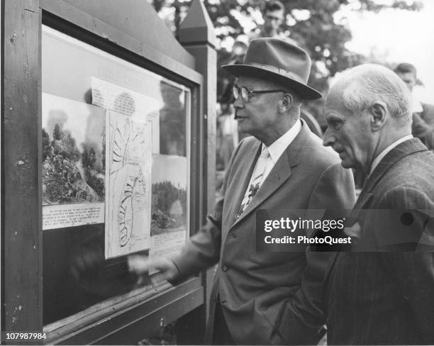 President Dwight Eisenhower and British Field Marshal Bernard Montgomery, 1st Viscount Montgomery of Alamein , read a map while on a visit to a US...