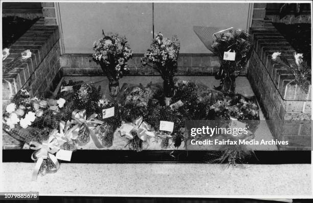 Strathfield Plaza massacre aftermath .Flowers next to the coffee pot. August 19, 1991. .