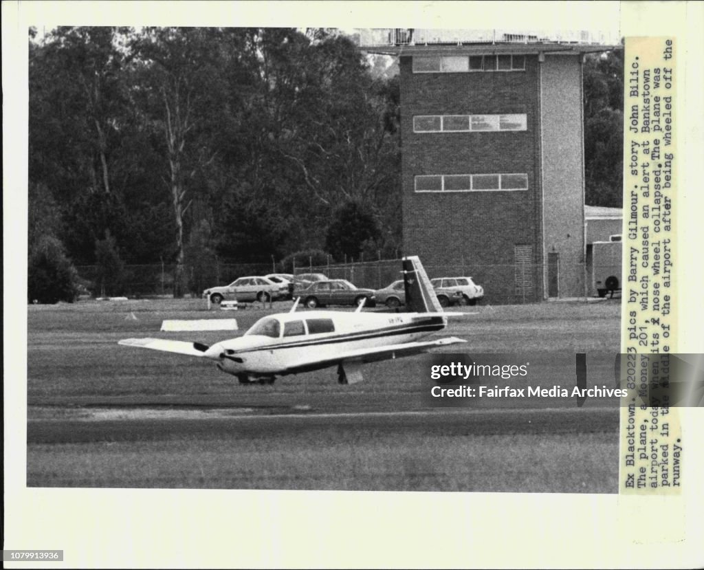 The plane, a Mooney 201, which caused an alert at Bankstown airport today when its nose wheel collapsed. The plane was parked in the middle of the airport after being wheeled off the runway.