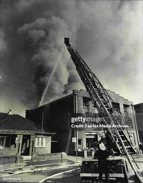 Firemen fighting a fire in a shoe factory in Sydenham today from 85 ft extension ladders.This is how one worker described a fire at the Riviera shoe...