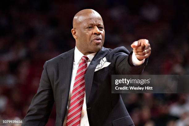 Head Coach Mike Anderson of the Arkansas Razorbacks yells instructions to his team during a game against the Florida Gators at Bud Walton Arena on...