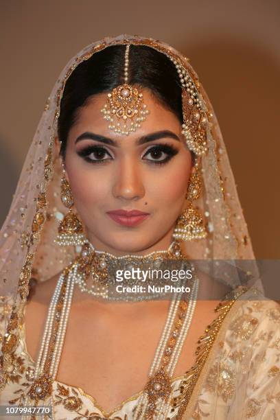 Indian model wearing an exquisite bridal lehenga with traditional... News  Photo - Getty Images