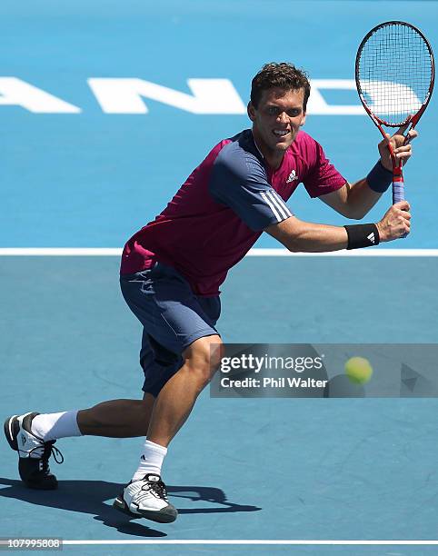 Tobais Kamke of Germany plays a backhand during his match against David Ferrer of Spain on day three of the Heineken Open at the ASB Tennis Centre on...