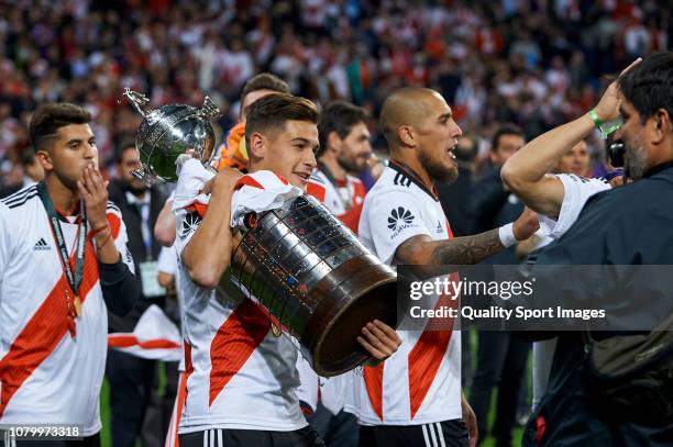 Julian Alvarez of River Plate celebrates with the trophy at the end of the second leg of the final match of Copa CONMEBOL Libertadores 2018 between...