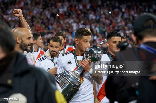 Julian Alvarez of River Plate celebrates with the trophy at the end of the second leg of the final match of Copa CONMEBOL Libertadores 2018 between...