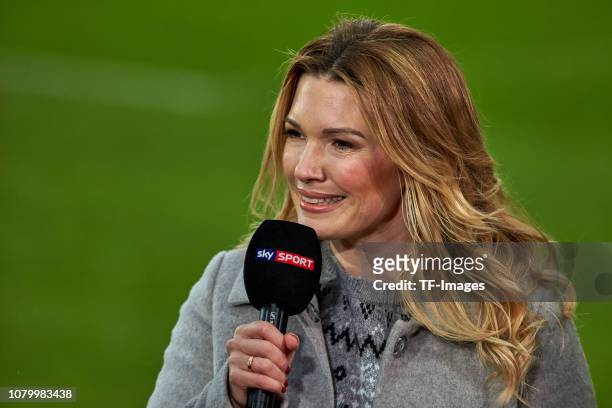 Sky presenter Jessica Kastrop looks on during the Bundesliga match between FC Augsburg and VfL Wolfsburg at WWK-Arena on December 23, 2018 in...