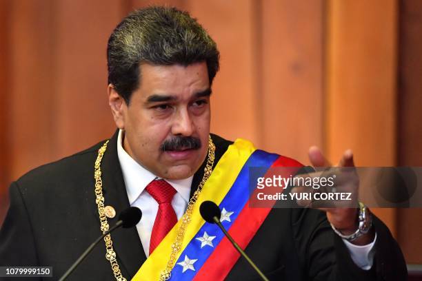 Venezuela's President Nicolas Maduro delivers a speech after being sworn-in for his second mandate, at the Supreme Court of Justice in Caracas on...