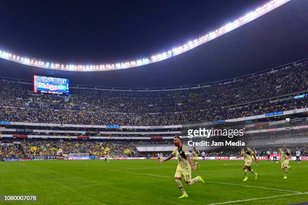 Victor Aguilera of America celebrates after scoring the sixth goal during the semifinal second leg match between America and Pumas UNAM as part of...