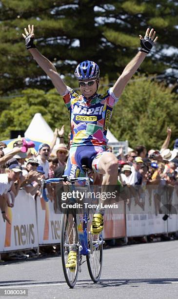 Michael Rogers of Australia celebrates as he crosses the line to win Stage 5 of the Tour Down Under cycle race held in the Barossa Valley wine region...