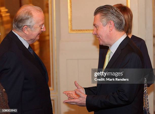 King Albert of Belgium and Member of the European Commission Karel De Gucht attend the New Years reception at the Royal Palace on January 12, 2011 in...