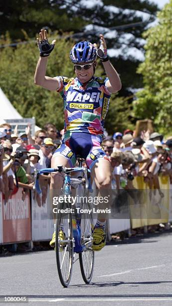 Michael Rogers of Australia celebrates as he crosses the line to win Stage 5 of the Tour Down Under cycle race held in the Barossa Valley wine region...