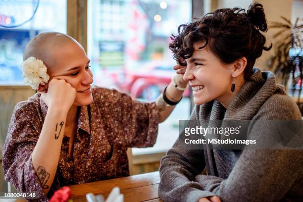 young lesbian couple. - lesbian date stock pictures, royalty-free photos & images