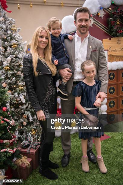 Actor Katy O'Grady, Lennon Michael Sloane, actor Barry Sloane and Gracie Sloane arrive at the Brooks Brothers Annual Holiday Celebration To Benefit...